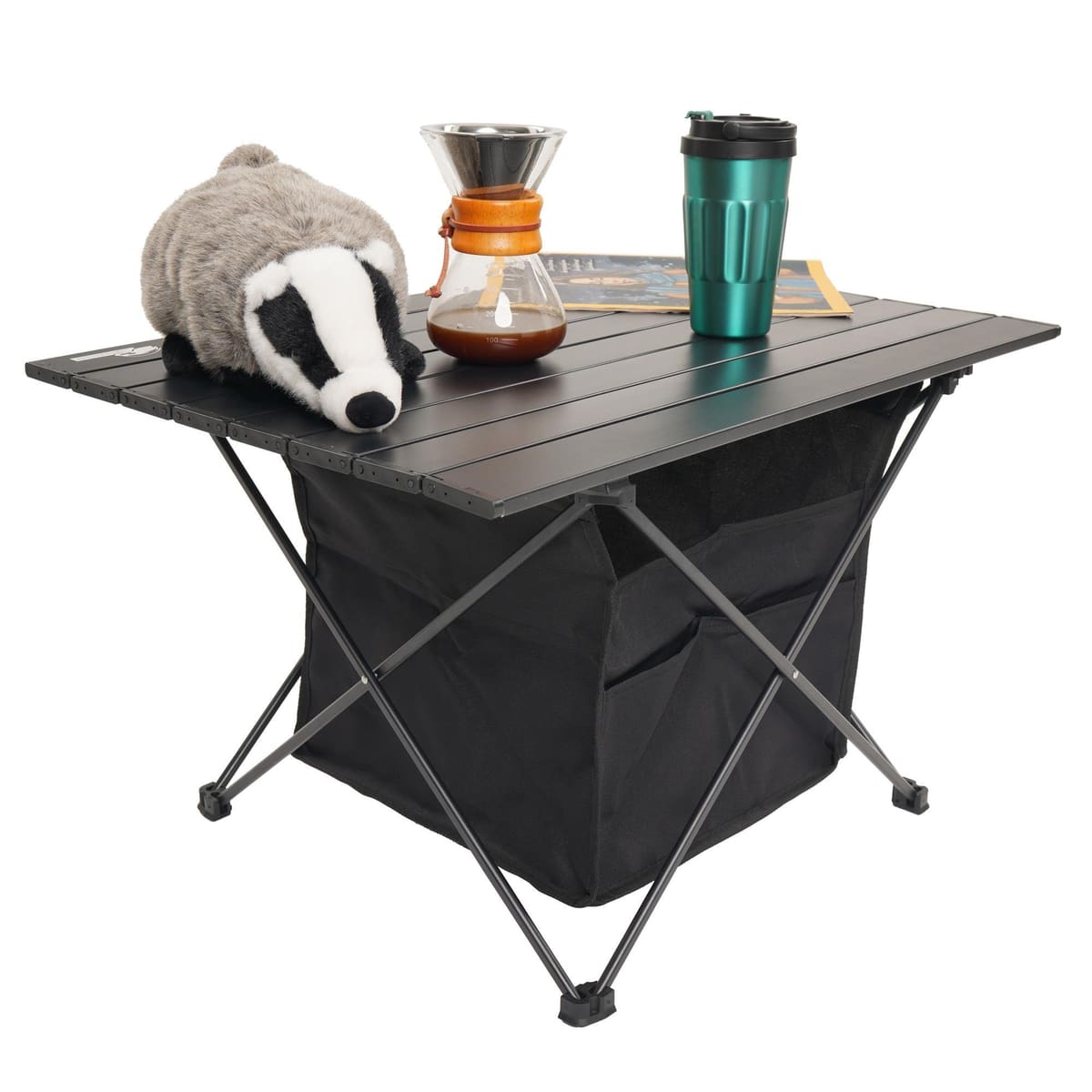 Odin table set with coffee and a badger plush toy
